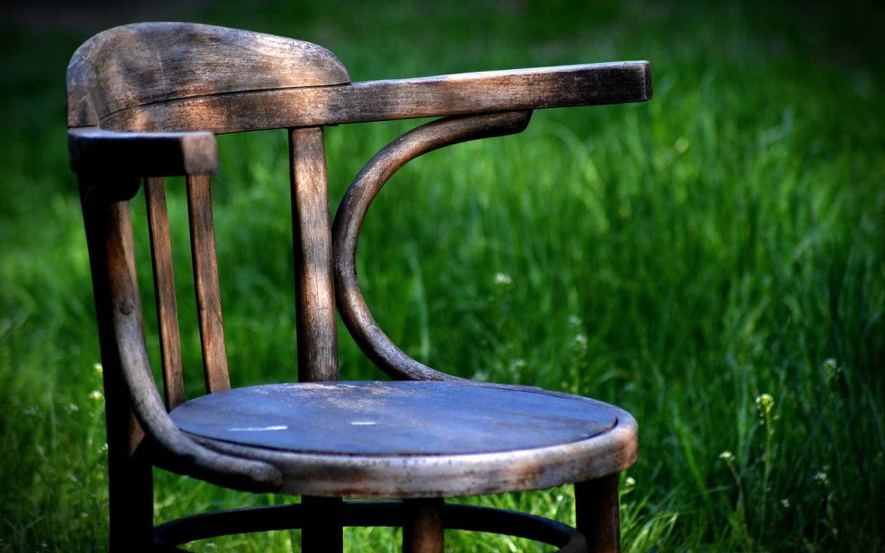 A hand carved wooded chair is made of oak, one of the best wood types for furniture.