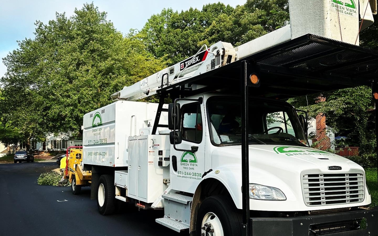 A Green Vista bucket truck parked in Fairfax, VA.