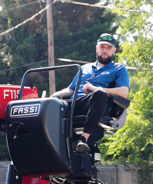 Daniel Foster on a crane truck of Green Vista Tree Care in NoVA.